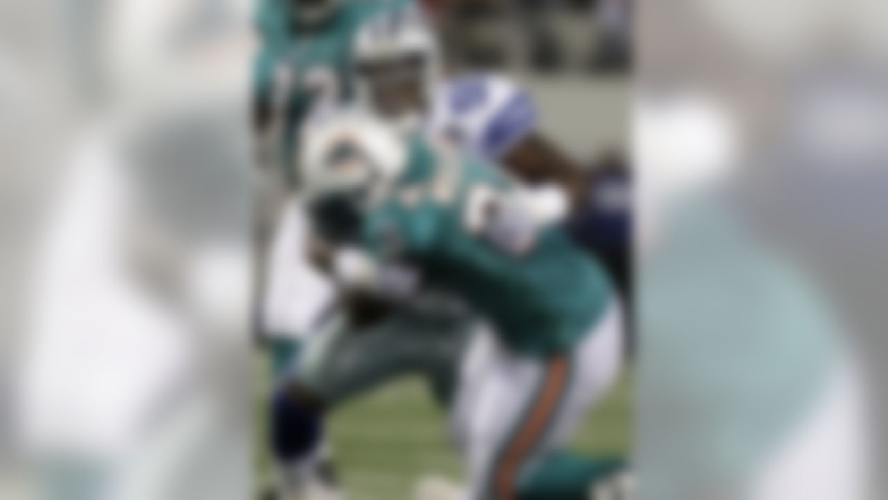 Dallas Cowboys linebacker Brandon Williams (59) stops Miami Dolphins running back Ricky Williams (34) in the first half of an NFL preseason football game, Thursday, Sept. 2, 2010, in Arlington, Texas. (AP Photo/LM Otero)