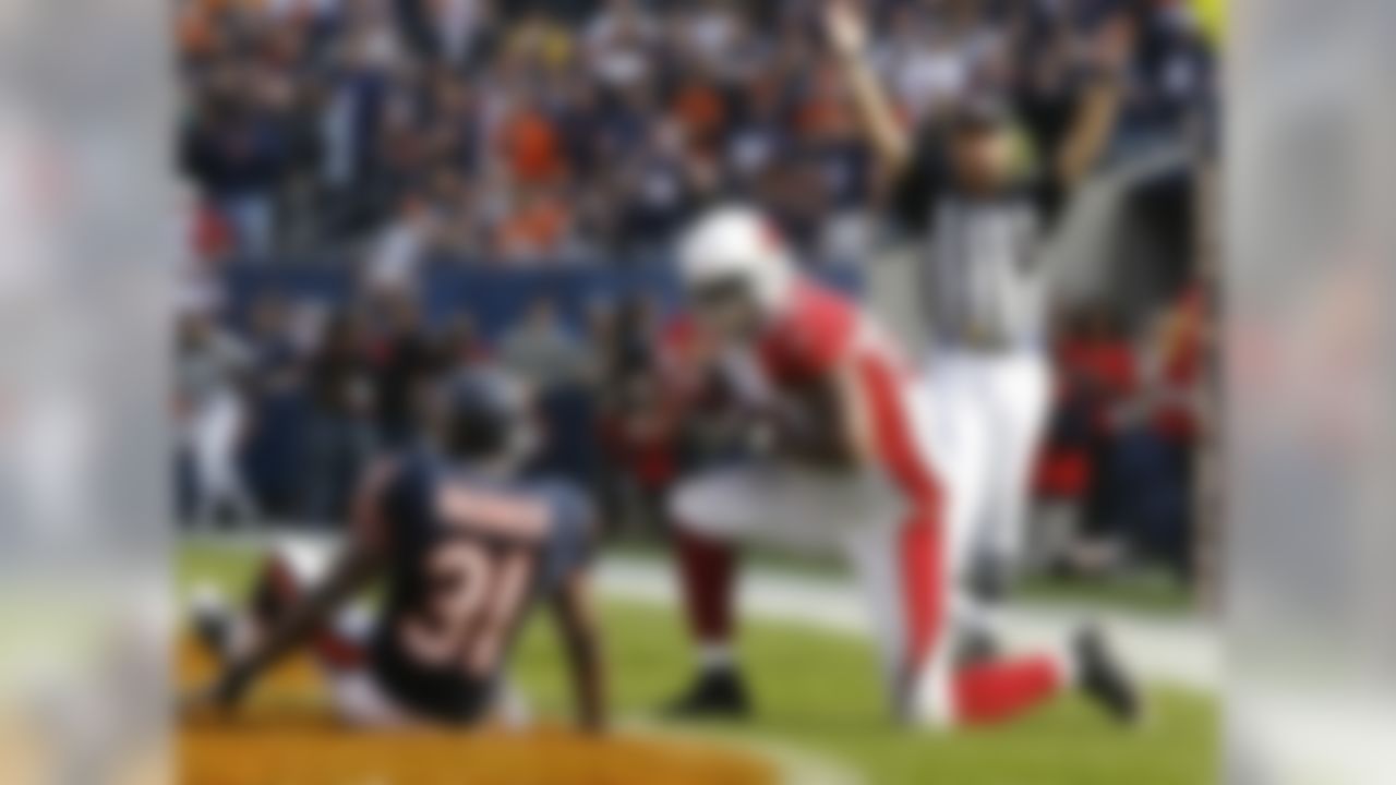 Arizona Cardinals tight end Ben Patrick (89) looks toward Chicago Bears cornerback Nathan Vasher (31) after making a touchdown-reception in the first quarter of an NFL football game in Chicago, Sunday, Nov. 8, 2009. (AP Photo/Nam Y. Huh)