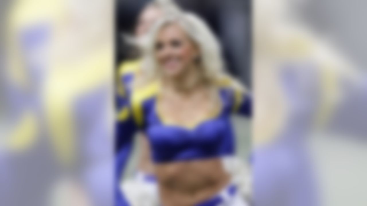 A St. Louis Rams cheerleader performs during the fourth quarter of an NFL football game against the New Orleans Saints Sunday, Oct. 30, 2011, in St. Louis. (AP Photo/Seth Perlman)