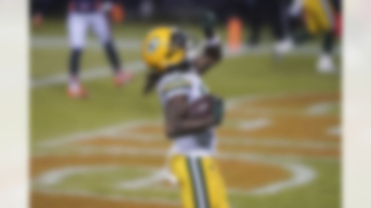 Green Bay Packers wide receiver Davante Adams (17) scores a touchdown during an NFL football game against the Chicago Bears on Sunday, January 3, 2021 in Chicago, Illinois.