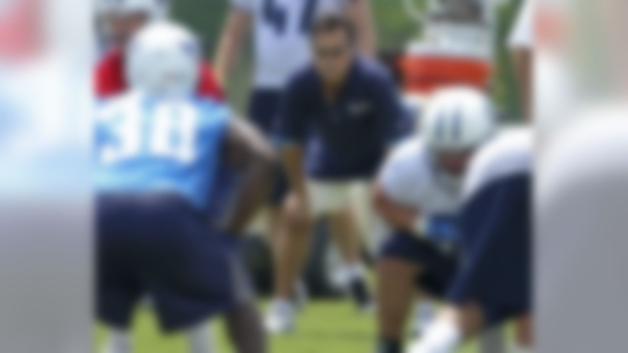 Tennessee Titans head coach Jeff Fisher watches as his team runs a play during football minicamp on Thursday, June 24, 2010, in Nashville, Tenn. (AP Photo/Mark Humphrey)