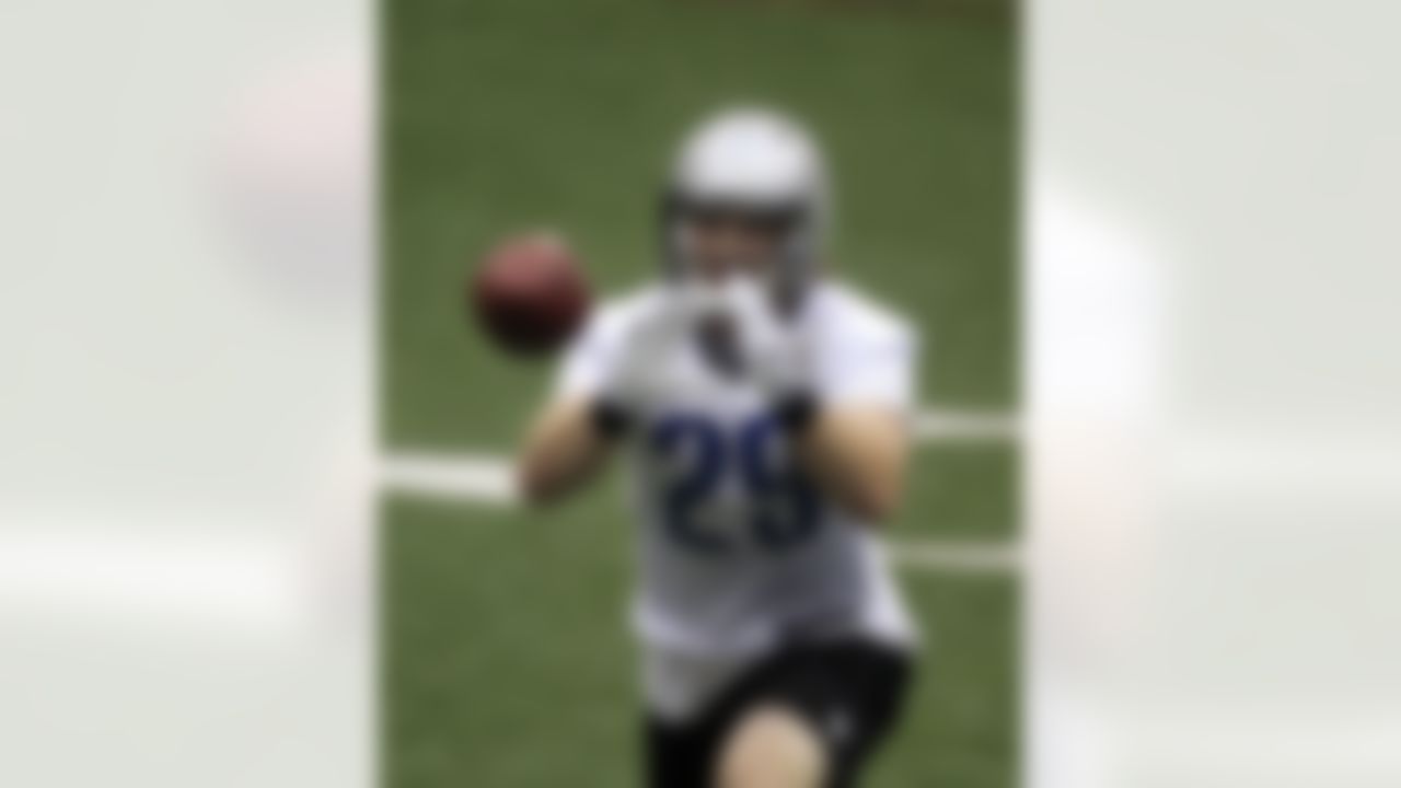 Detroit Lions safety John Wendling catches a ball during football drills at the Detroit Lions training facility in Allen Park, Mich. Friday, July 27, 2012. (AP Photo/Carlos Osorio)