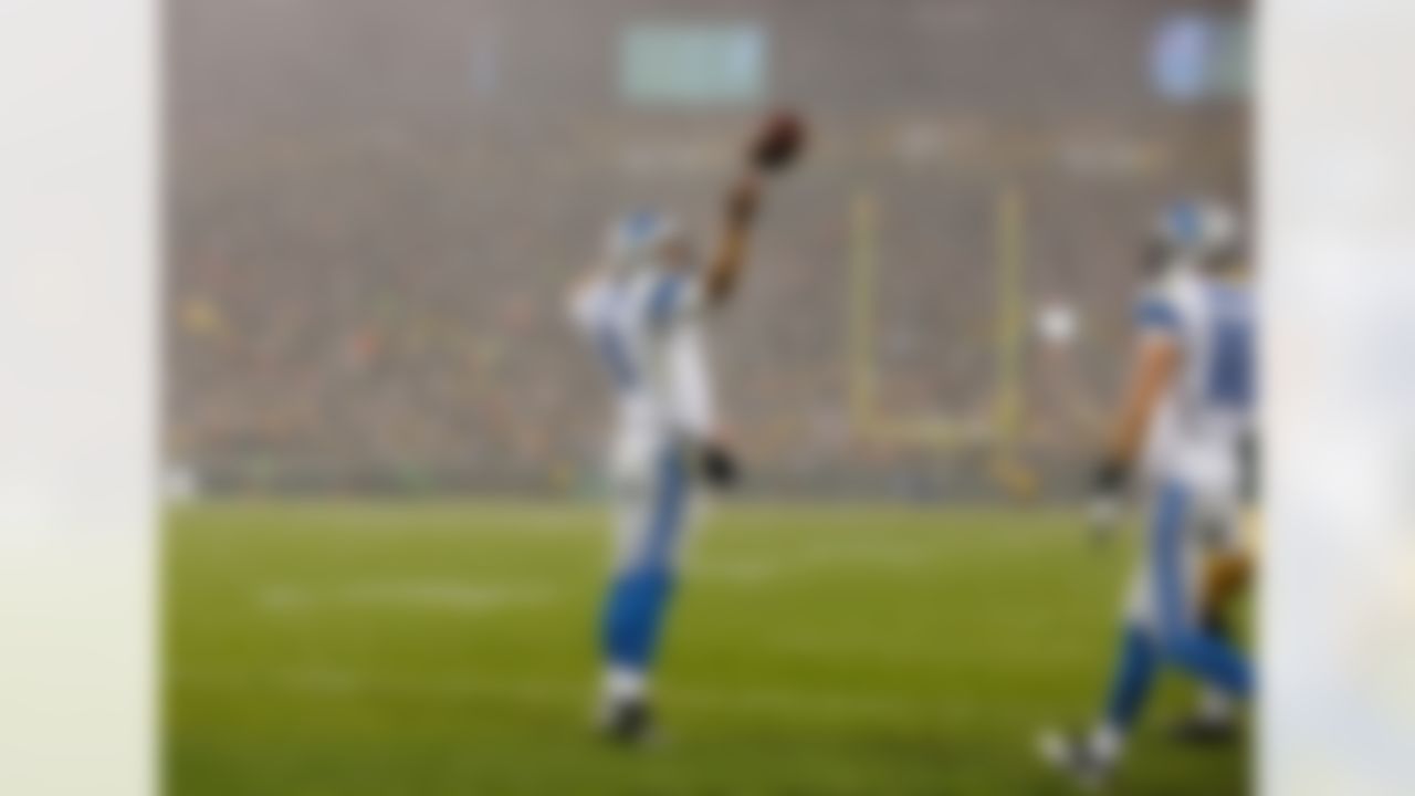 Detroit Lions' Matthew Stafford reacts after rushing for a touchdown during the first half of an NFL football game against the Green Bay Packers Sunday, Dec. 9, 2012, in Green Bay, Wis. (AP Photo/Jeffrey Phelps)
