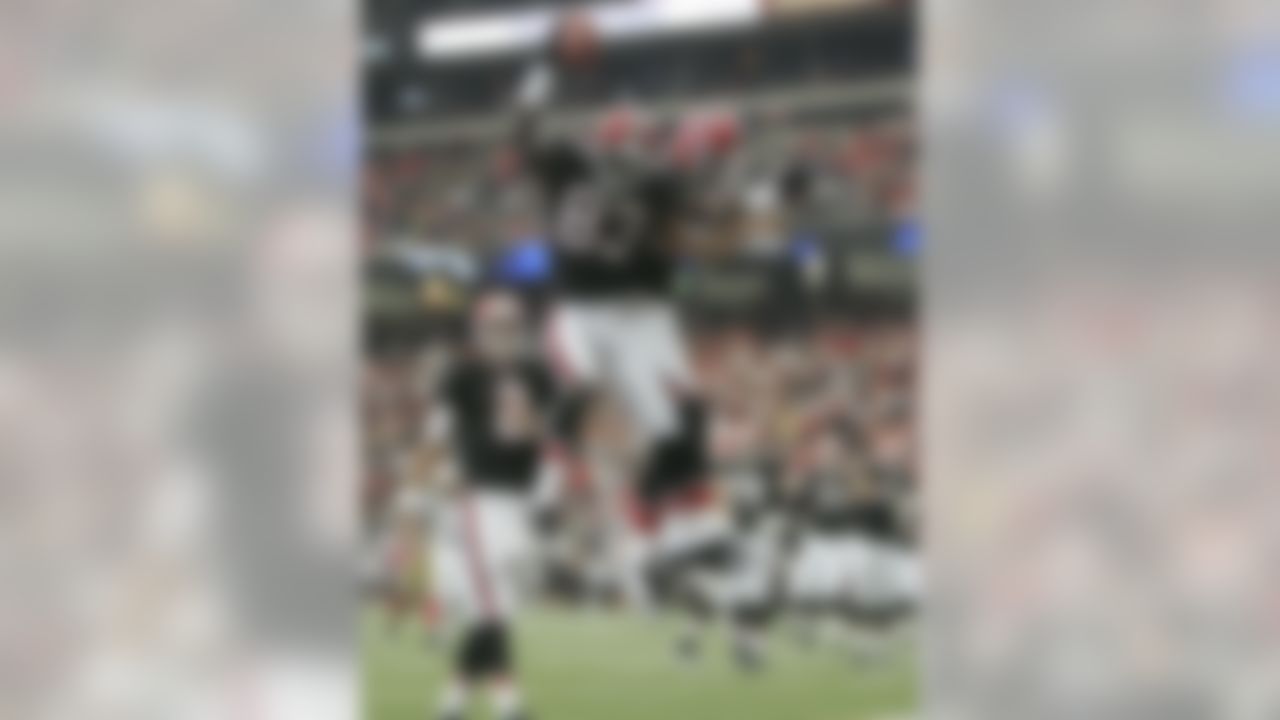 Atlanta Falcons receiver Harry Douglas (83) celebrates with teammate Brian Finnerman, right, as quarterback Matt Ryan (2) looks on after scoring a touchdown against the San Francisco 49ers during the first half of an NFL football game at the Georgia Dome in Atlanta, Sunday, Oct. 3, 2010. (AP Photo/John Amis)