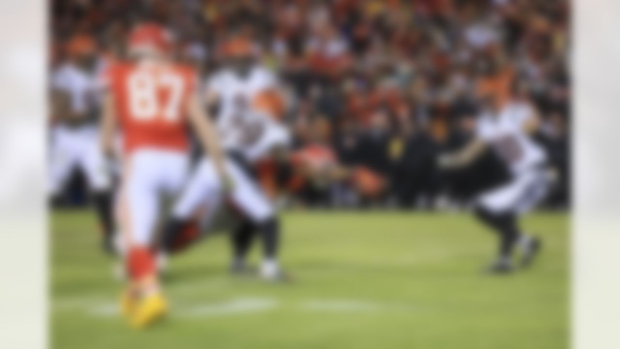 Kansas City Chiefs wide receiver Marquez Valdes-Scantling (11) reaches for a first down during an NFL Conference Championship playoff game against the Cincinnati Bengals on Sunday, January 29, 2023 in Kansas City, Missouri.