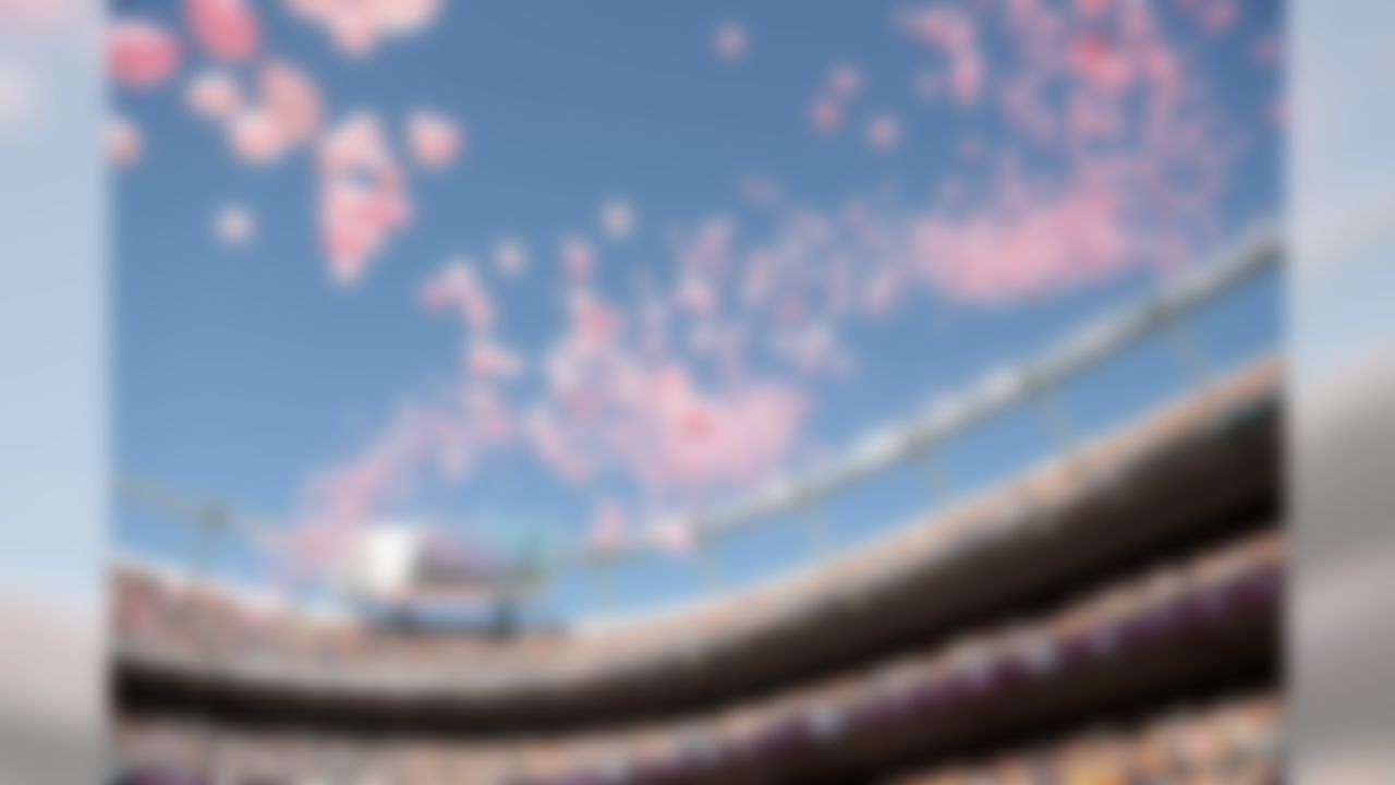 Pink balloons are released inside Sports Authority Field at Mile High Stadium to commemorate Breast Cancer Awareness month in Denver. (AP Photo/Joe Mahoney)