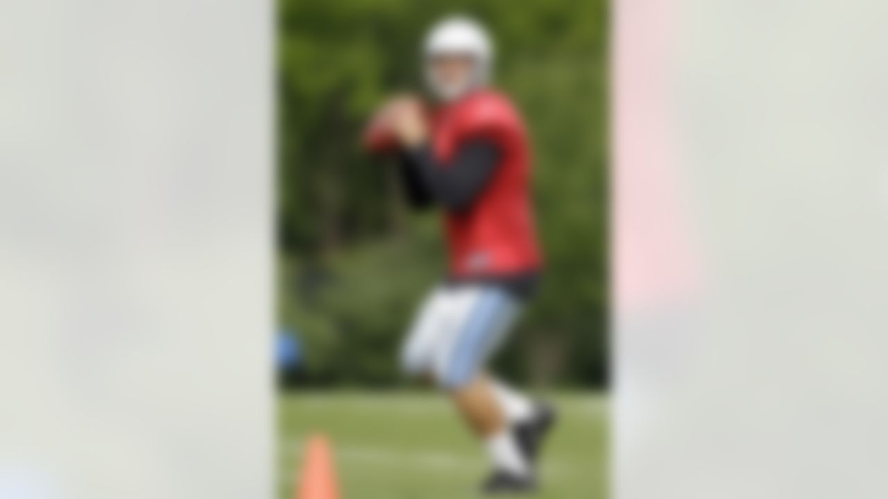 Detroit Lions quarterback Matthew Stafford prepares to throw during NFL football training camp in Allen Park, Mich., Tuesday, Aug. 2, 2011. (AP Photo/Carlos Osorio)