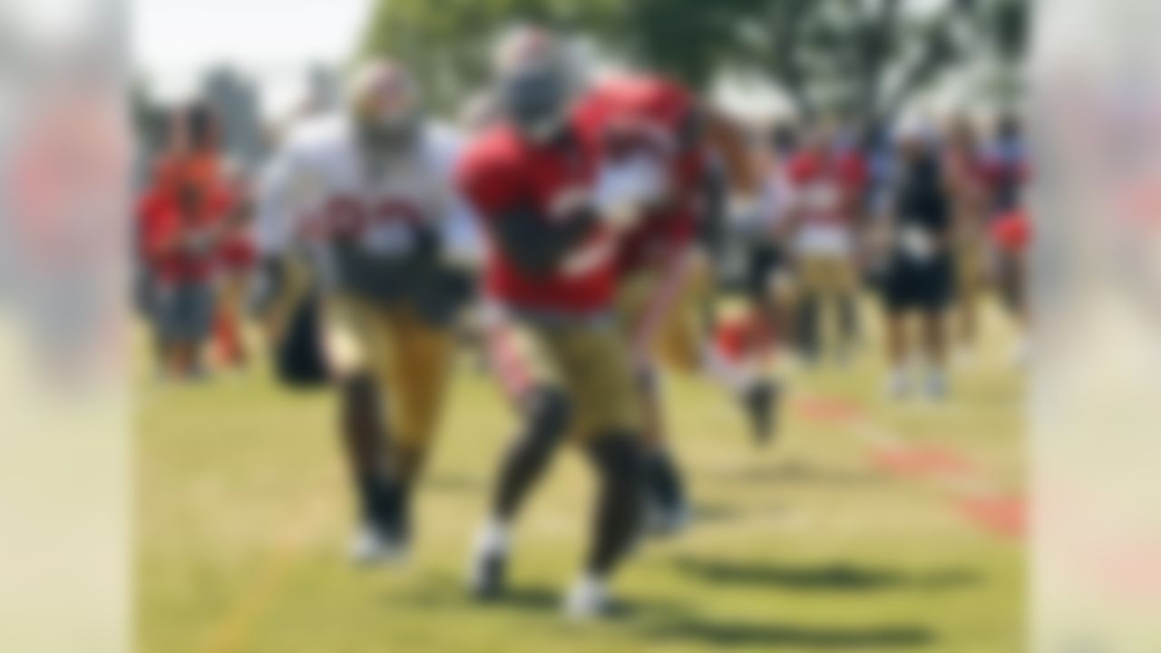 San Francisco 49ers running back Frank Gore runs after a reception during NFL football training camp in Santa Clara, Calif., Monday, Aug. 9, 2010. (AP Photo/Marcio Jose Sanchez)