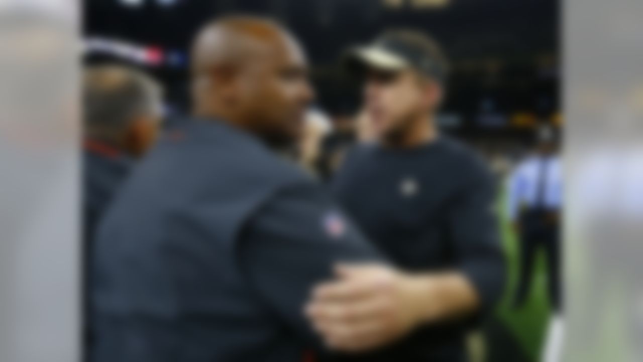Cleveland Browns head coach Hue Jackson, left, meets with New Orleans Saints head coach Sean Payton after an NFL football game in New Orleans, Sunday, Sept. 16, 2018. The Saints won 21-18. (AP Photo/Butch Dill)