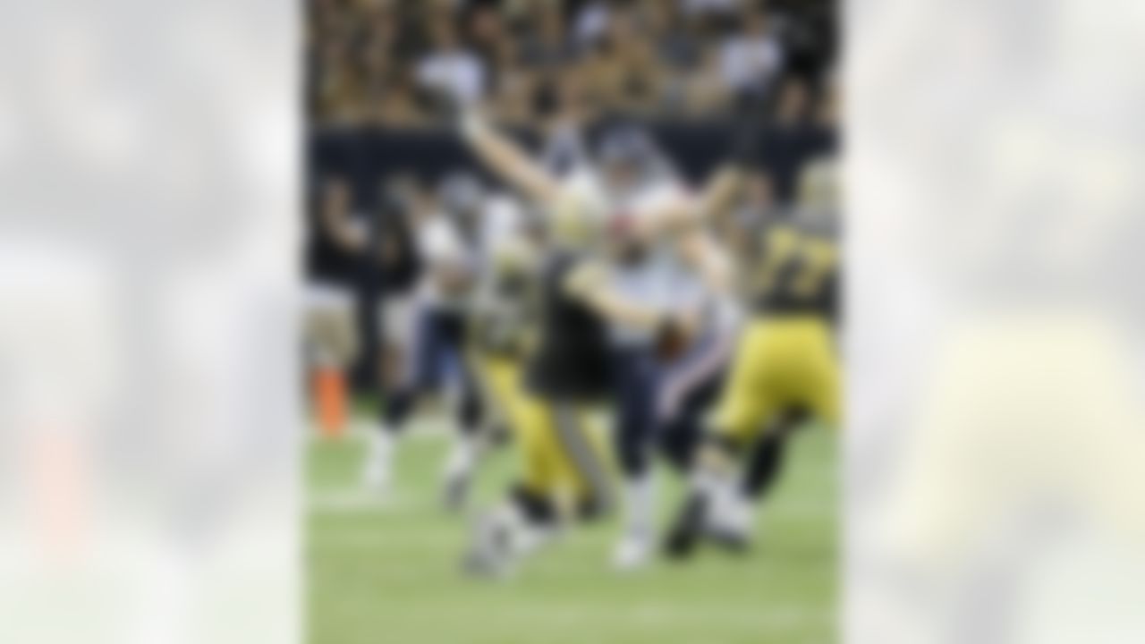 Houston Texans Defensive End J.J. Watt (59) rushes the Saints Quarterback Drew Brees (9) during an NFL football game against the New Orleans Saints, Sunday September 5, 2011 in New Orleans, LA. (AP Photo/Bill Baptist)