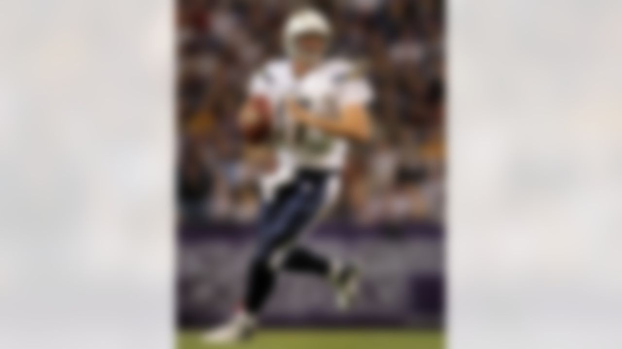 MINNEAPOLIS, MN - NOVEMBER 04:  Quarterback Philip Rivers #17 the San Diego Chargers rolls out against the Minnesota Vikings at the Hubert H. Humphrey Metrodome on November 4, 2007 in Minneapolis, Minnesota. The Vikings defeated the Chargers 35-17.  (Photo by Doug Pensinger/Getty Images)