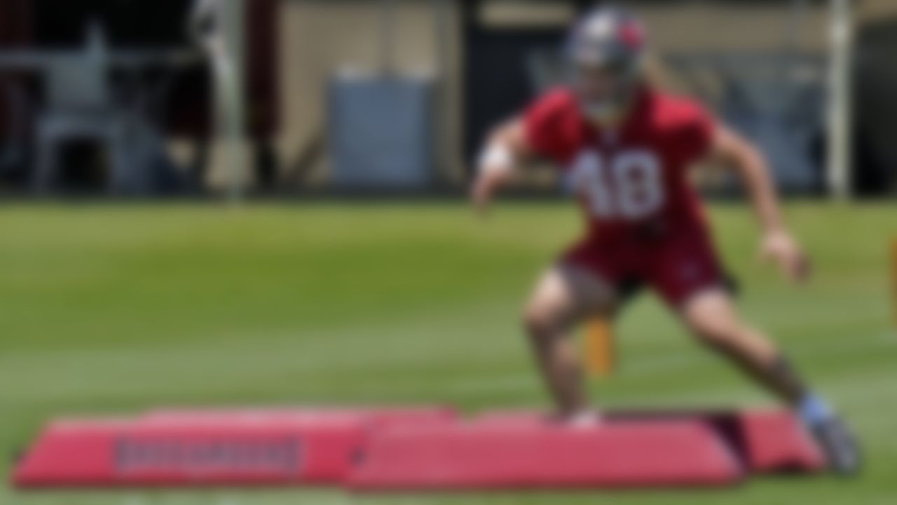 Tampa Bay Buccaneers linebacker Grant Stuard runs through a drill during a Buccaneers NFL football rookie
minicamp Friday, May 14, 2021, in Tampa, Fla. Stuard, from Houston, was drafted by the Buccaneers in the seventh round.