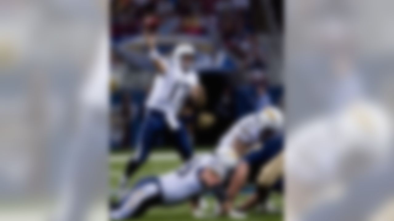 ST. LOUIS, MO - AUGUST 18: Philip Rivers #17 of the San Diego Chargers looks to pass against the St. Louis Rams on August 18, 2007 at the Edward Jones Dome in St. Louis, Missouri.  (Photo by Dilip Vishwanat/Getty Images)