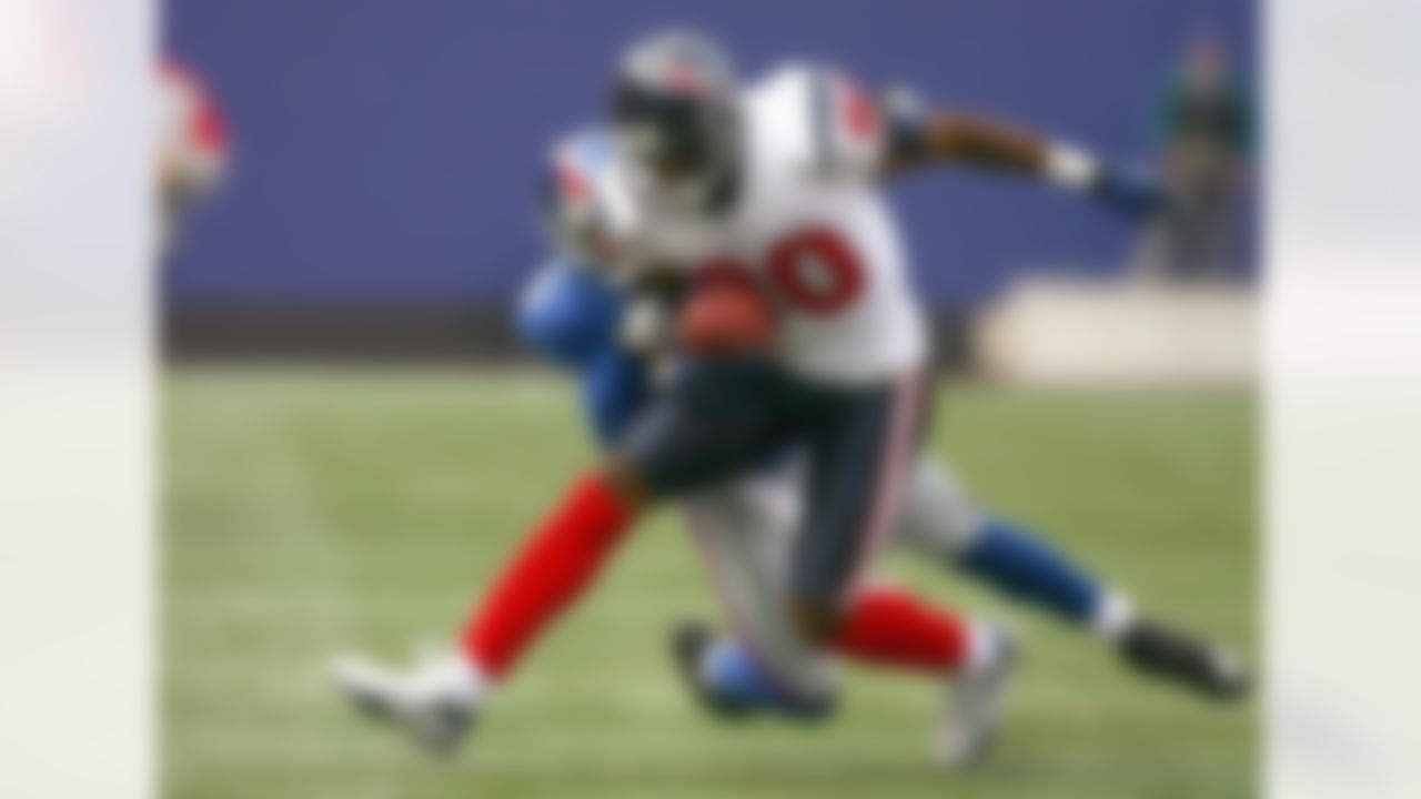 EAST RUTHERFORD,NJ - NOVEMBER 5: Andre Johnson #80 of the Houston Texans carries the ball during the game against the New York Giants on November 5, 2006 at Giants Stadium in East Rutherford, New Jersey. Photo by Getty Images.
