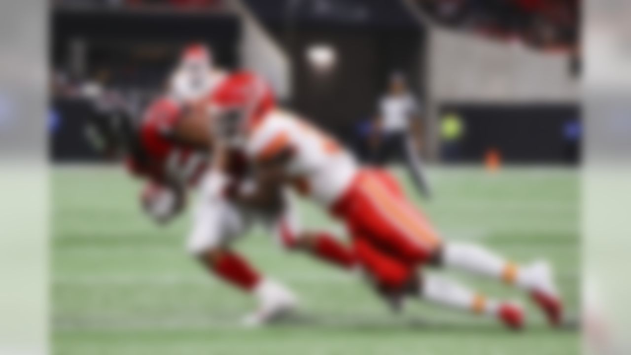 Kansas City Chiefs defensive back Arrion Springs (38) tackles Atlanta Falcons running back Ito Smith (25) during a NFL preseason game, Friday, Aug. 17th, 2018 in Atlanta.  (Logan Bowles / NFL)