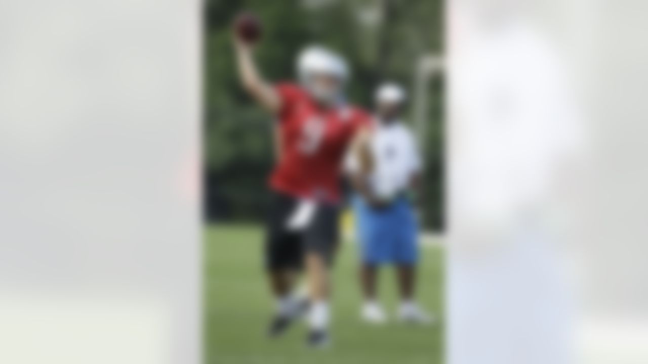 Detroit Lions quarterback Matthew Stafford throws during drills at the NFL football team's training camp in Allen Park, Mich., Friday, Aug. 5, 2011. (AP Photo/Carlos Osorio)