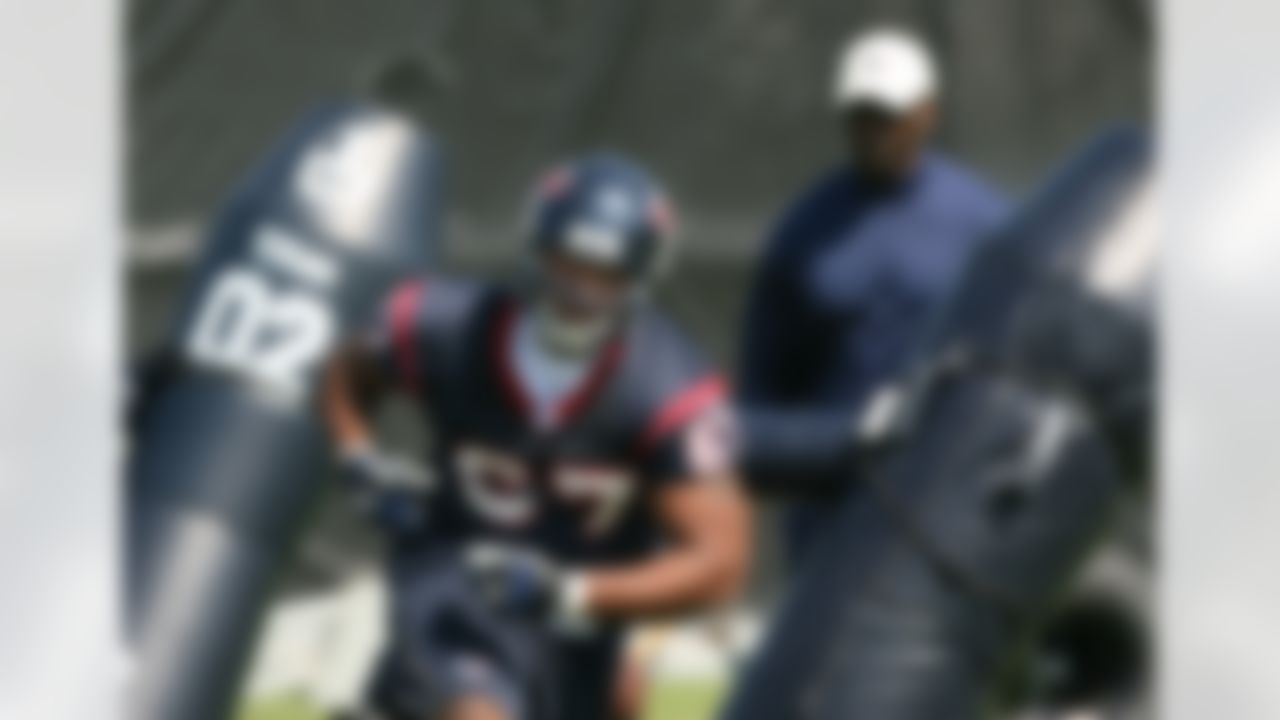 HOUSTON - MAY 09:  Rookie defensive tackle  Gabe Long #67  of the Houston Texans runs drills during a morning practice session May 9, 2008 in Houston, Texas.  (Photo by Bob Levey/Getty Images)