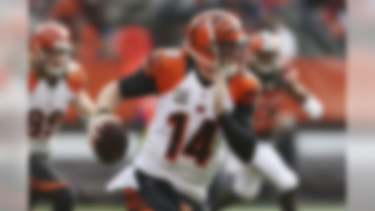 Cincinnati Bengals quarterback Andy Dalton scrambles in the first half of an NFL football game against the Cleveland Browns, Sunday, Dec. 6, 2015, in Cleveland. (AP Photo/Ron Schwane)