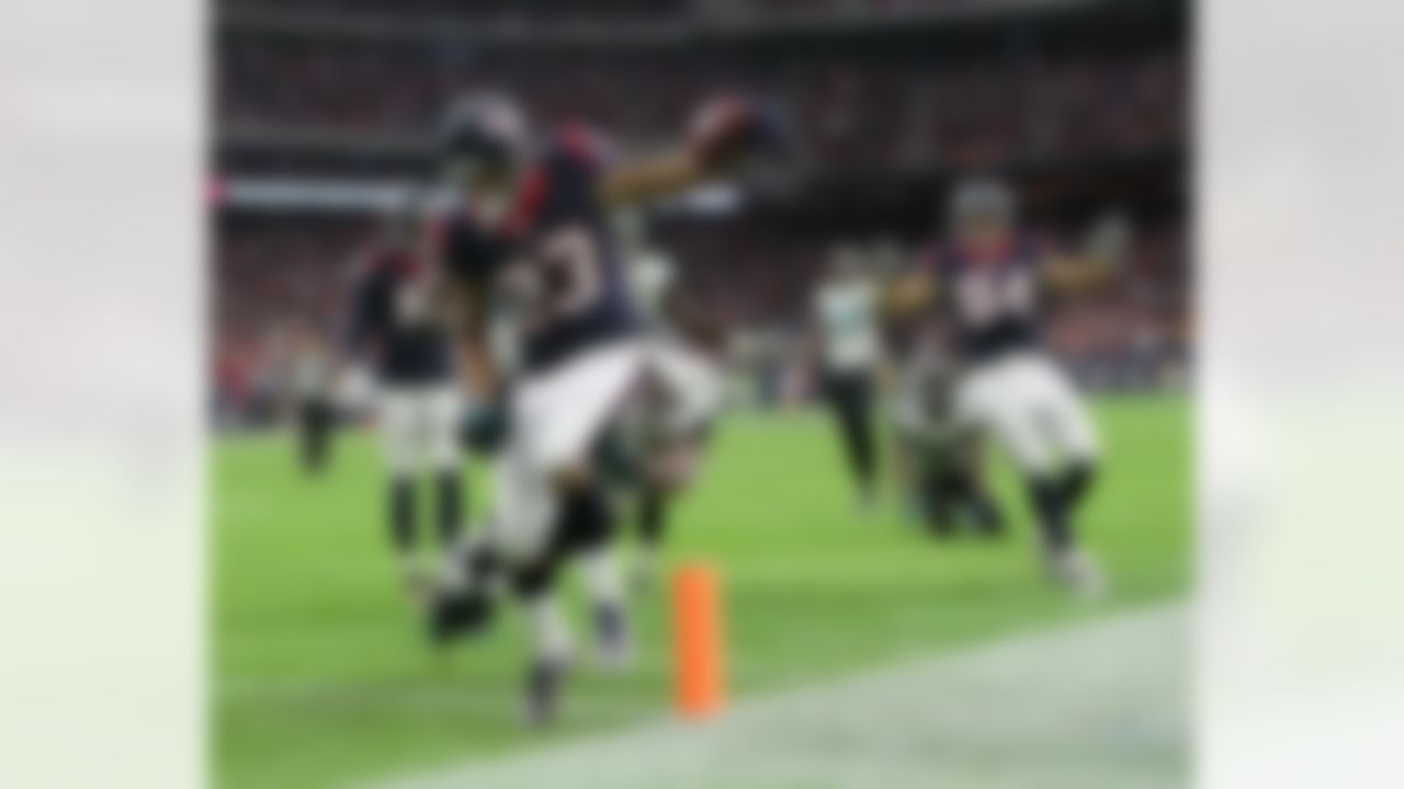 Houston Texans running back Arian Foster (23) runs for a touchdown  in action against the Jacksonville, Jaguars on Sunday December 28, 2014 in Houston, Texas   (Damian Strohmeyer via AP)