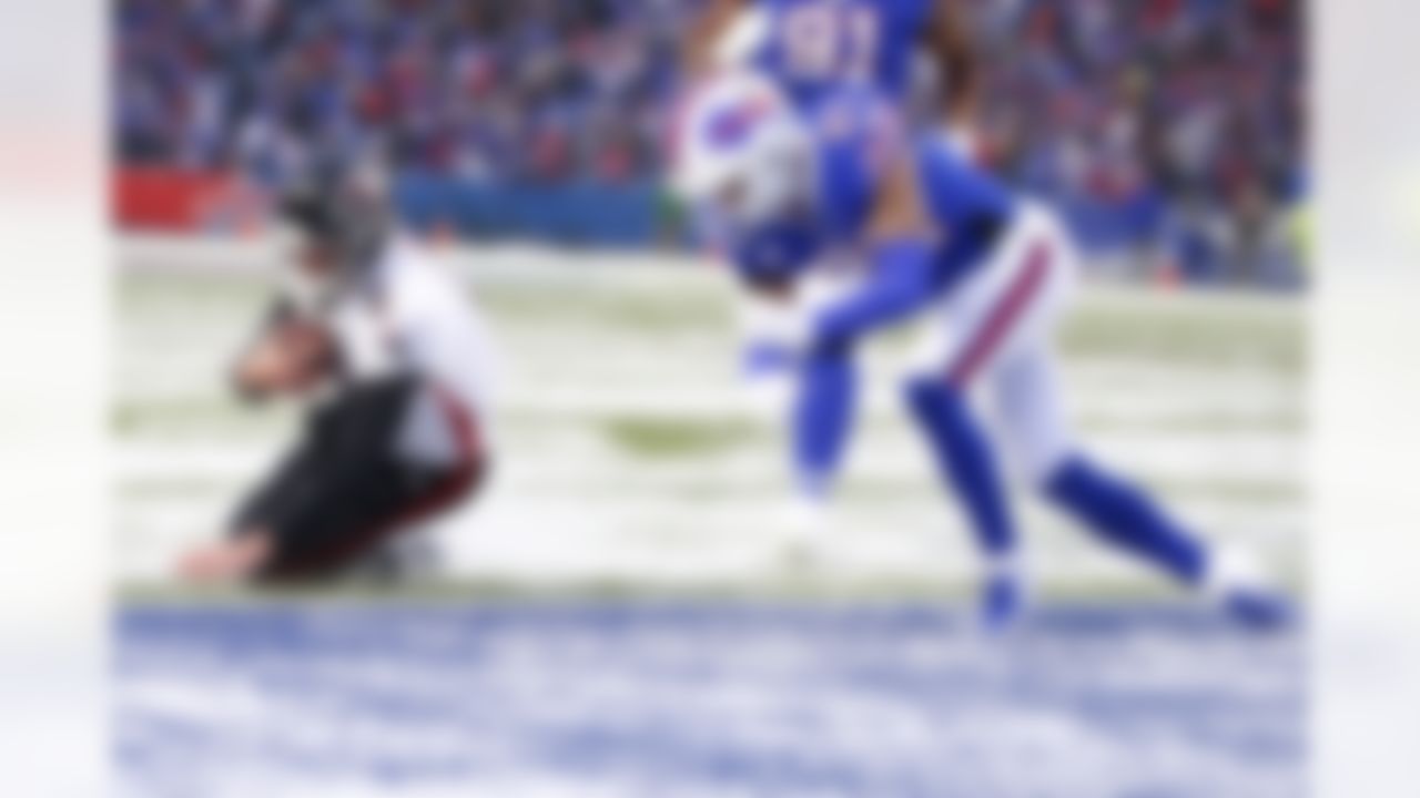 Atlanta Falcons quarterback Matt Ryan (2) dives for the end zone in front of Buffalo Bills free safety Jordan Poyer (21) during the second half of an NFL football game Sunday, Jan. 2, 2022, in Orchard Park, N.Y. After review Ryan was ruled down before reaching the end zone. The Bills won 29-15.