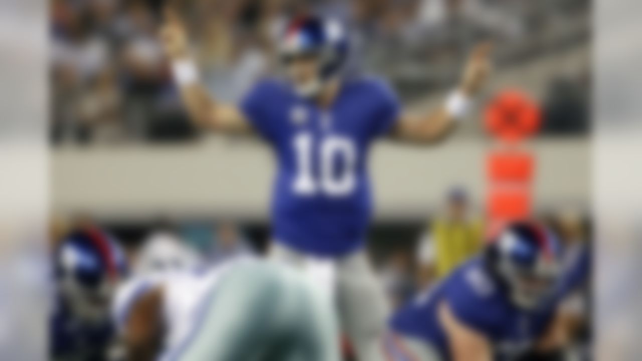 New York Giants quarterback Eli Manning (10) calls out a play prior to the snap against the Dallas Cowboys at Cowboys Stadium in Arlington, Texas on October 24, 2010. (Aaron M. Sprecher/NFL)