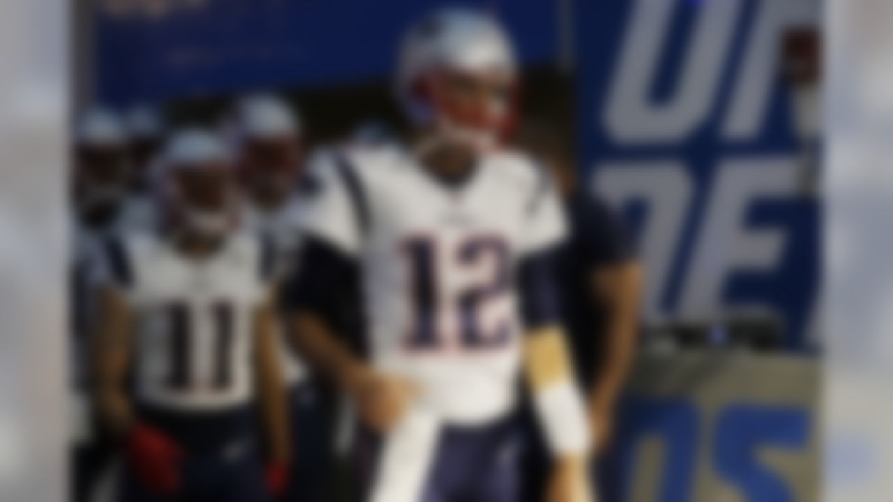 New England Patriots quarterback Tom Brady leads the team onto the field for an NFL preseason football game against the Detroit Lions, Friday, Aug. 25, 2017, in Detroit. (AP Photo/Carlos Osorio)