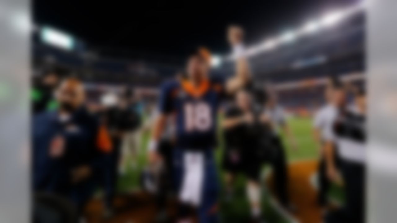 Denver Broncos quarterback Peyton Manning (18) waves to the fans after the NFL game against the San Francisco 49ers on Sunday, Oct. 19, 2014 at Sports Authority Field at Mile High in Denver. (Ric Tapia/NFL)