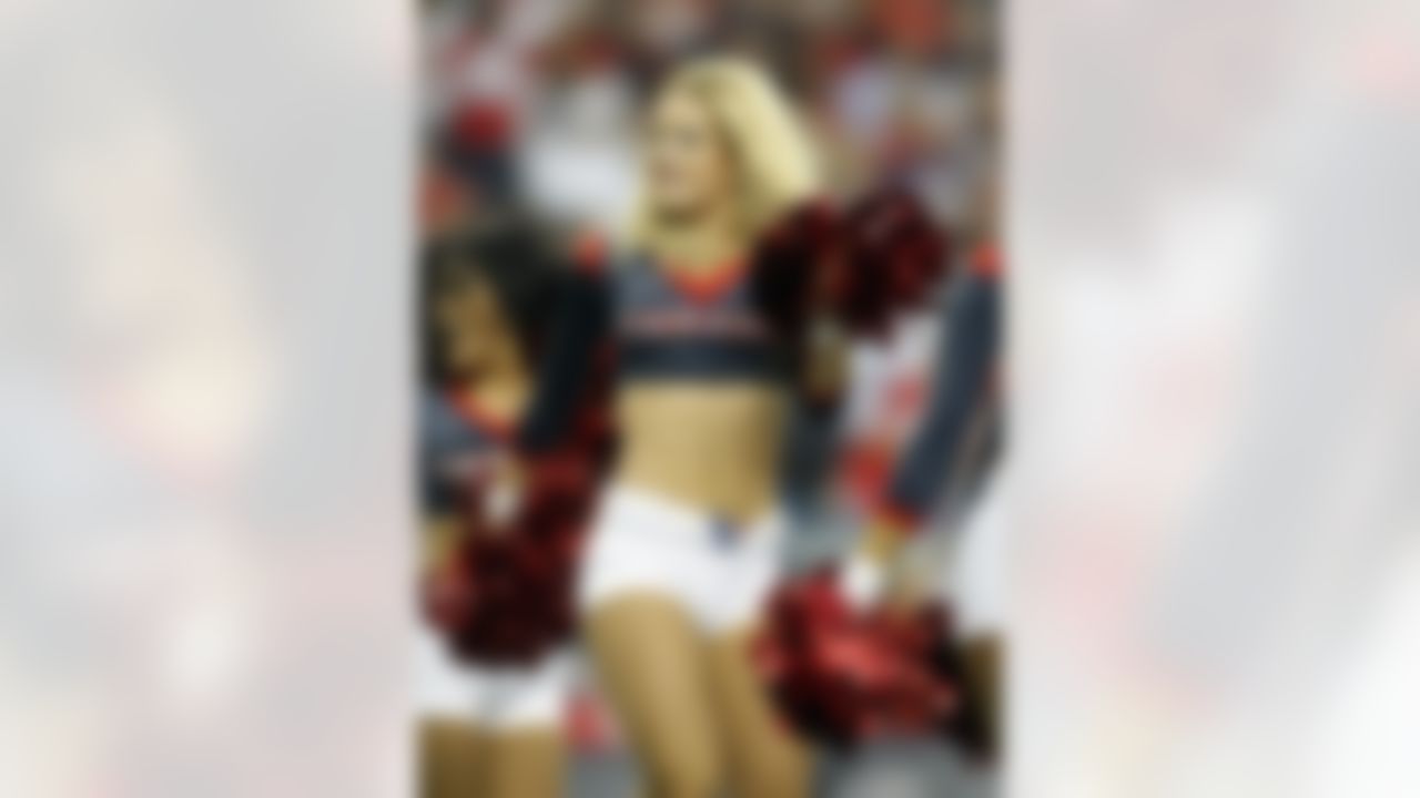 Houston Texans cheerleaders perform against the Cincinnati Bengals during the second quarter of the AFC Wild Card playoff game at Reliant Stadium. (Brett Davis/US Presswire)