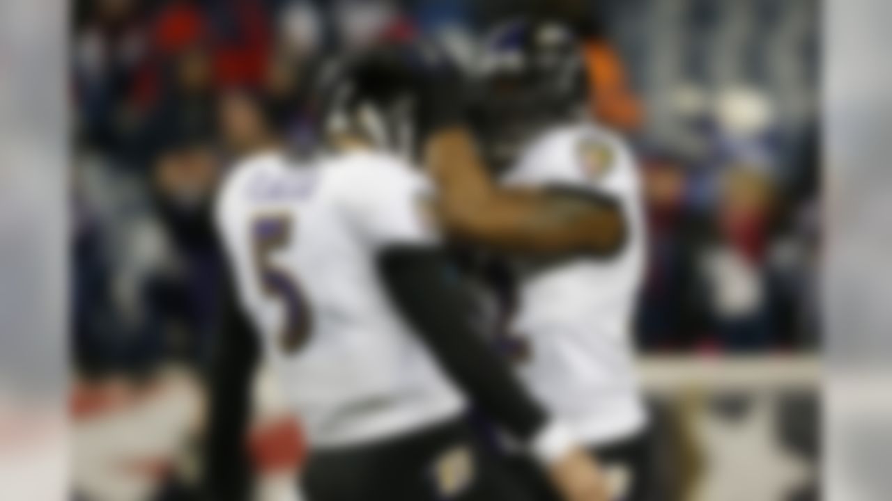 Baltimore Ravens Ray Lewis reacts with Joe Flacco after the game