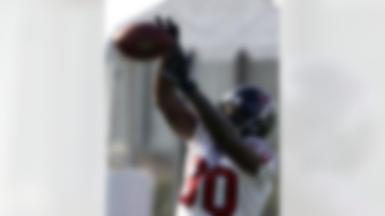 Houston Texans wide receiver Andre Johnson catches a pass during the team's first NFL training camp practice of the season Friday, July 30, 2010 in Houston. (AP Photo/David J. Phillip)