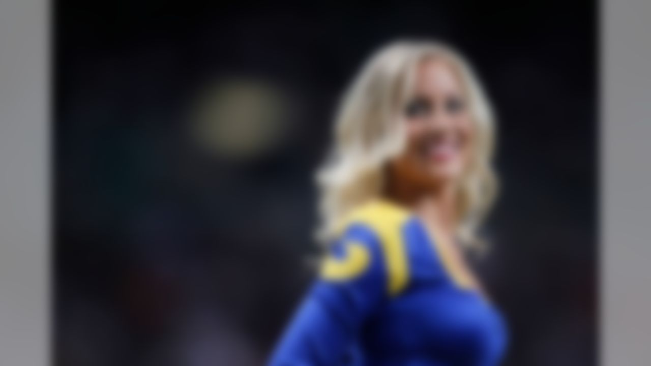 A St. Louis Rams cheerleader performs during the second quarter of an NFL football game against the New Orleans Saints Sunday, Oct. 30, 2011, in St. Louis. (AP Photo/Jeff Roberson)