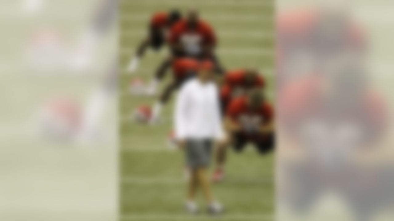 Kansas City Chiefs coach Todd Haley walks among his team during a football mini camp at the team's practice facility Monday, May 17, 2010, in Kansas City, Mo. (AP Photo/Orlin Wagner)