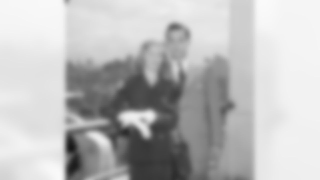 William Clay Ford, grandson of the late Henry Ford, greets his fiancee, Martha Firestone, daughter of Mr. and Mrs. Harvey Firestone Jr., as she arrives in New York aboard the Queen Elizabeth in New York from Europe, June 9, 1947. The couple have announced wedding plans for June 21 at Akron, Ohio. Miss Firestone, her parents and her sister Elizabeth returned from a vacation in France and England. (AP Photo/Anthony Camerano)