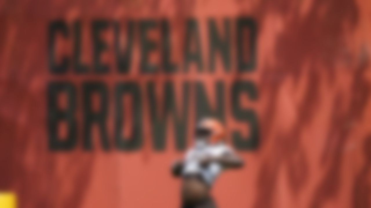 Cleveland Browns linebacker Jeremiah Owusu-Koramoah stretches during an NFL football rookie minicamp at the team's training camp facility, Friday, May 14, 2021, in Berea, Ohio.