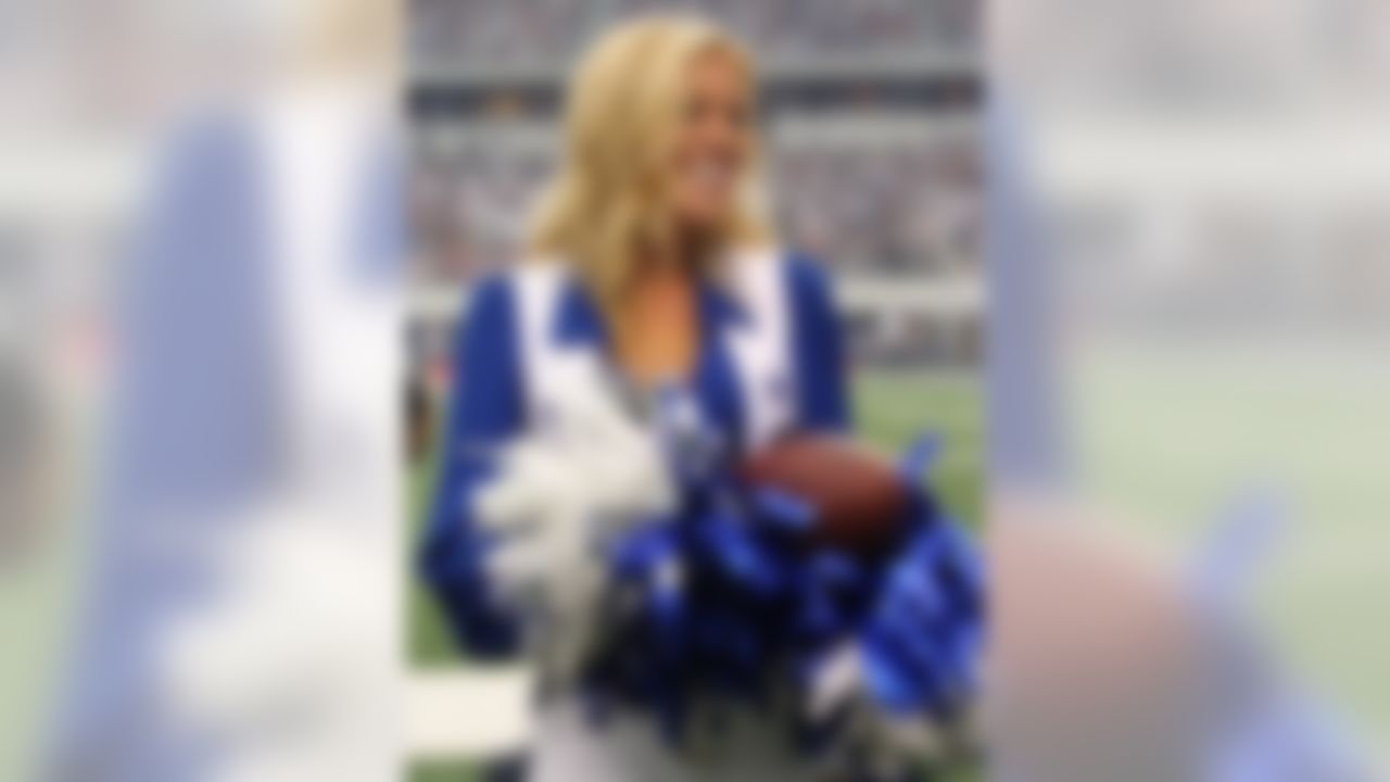 Dallas Cowboys cheerleader Kelsi Reich after getting a football from boyfriend Buffalo Bills receiver David Nelson (not pictured) after he scored in the second quarter against the Cowboys.  (Matthew Emmons-US PRESSWIRE)