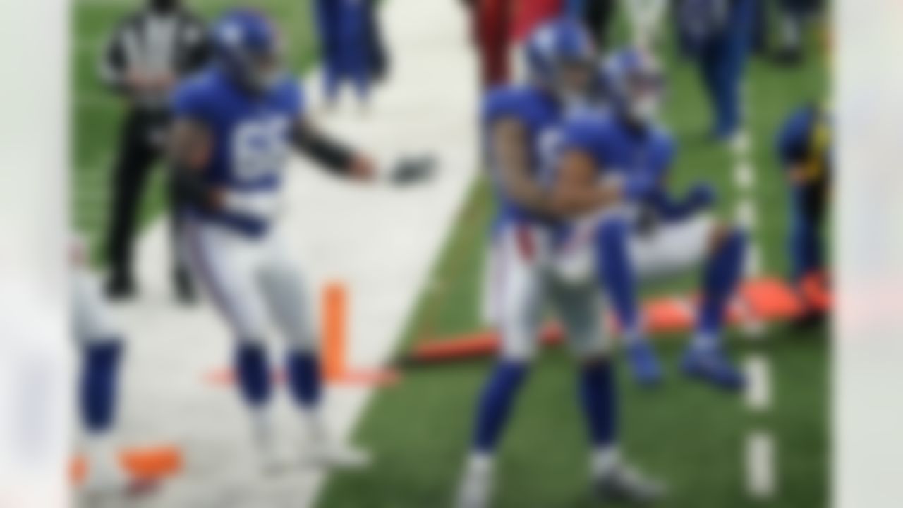 New York Giants' Sterling Shepard (87), right, celebrates his touchdown during the first half of an NFL football game against the Dallas Cowboys, Sunday, Jan. 3, 2021, in East Rutherford, N.J.