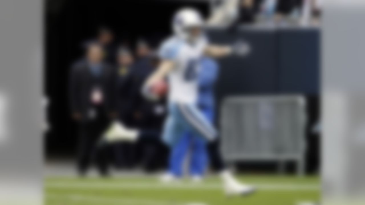 Tennessee Titans' Marc Mariani (83) celebrates his punt return for a touchdown against the Carolina Panthers during the first quarter of an NFL football game in Charlotte, N.C., Sunday, Nov. 13, 2011. (AP Photo/Chuck Burton)