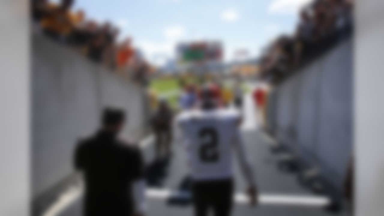 Cleveland Browns quarterback Johnny Manziel (2) comes out of the tunnel for warmups before the NFL football game against the Pittsburgh Steelers on Sunday, Sept. 7, 2014 in Pittsburgh. (AP Photo/Gene Puskar)