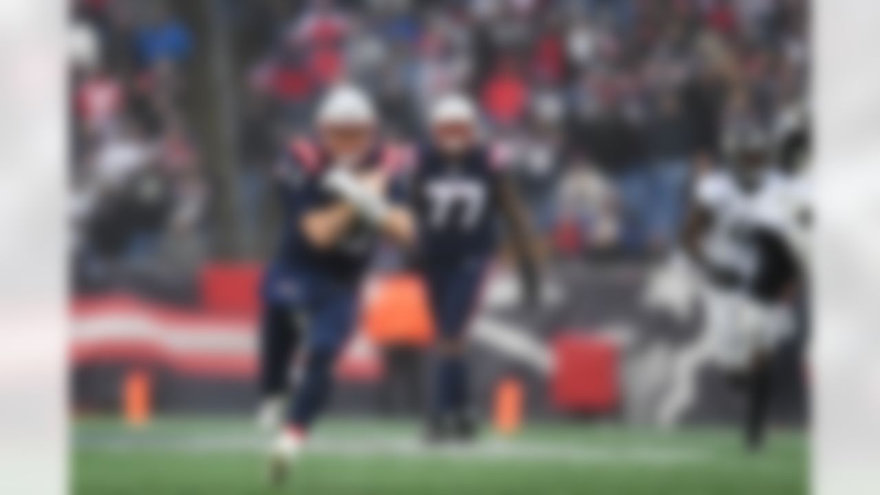 New England Patriots quarterback Mac Jones (10) scrambles during an NFL football game against the Jacksonville Jaguars on Sunday, January 2, 2022 in Foxborough, Massachusetts.
