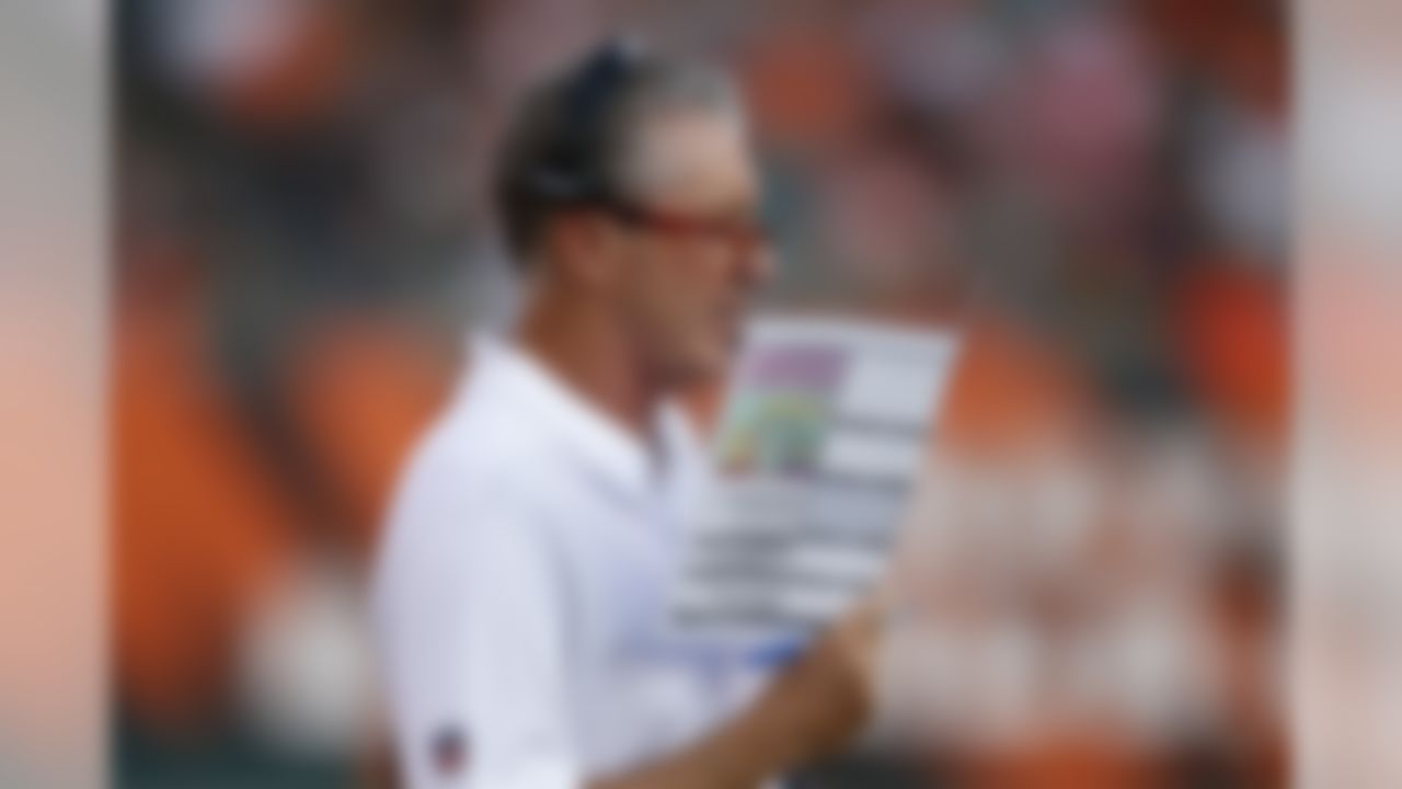 Tampa Bay Buccaneers coach Dirk Koetter works the sideline in the first half of the team's preseason NFL football game against the Cincinnati Bengals, Friday, Aug. 11, 2017, in Cincinnati. (AP Photo/Gary Landers)