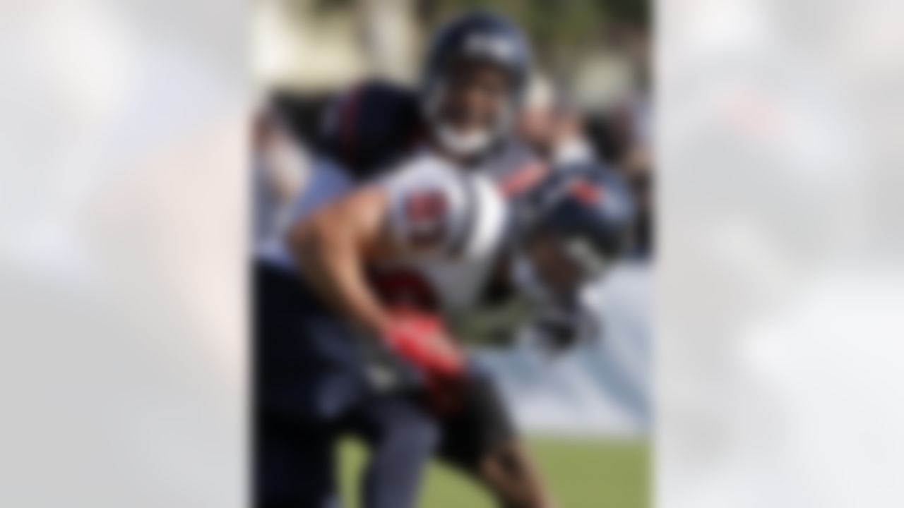 Houston Texans cornerback Glover Quin (29) hits wide receiver Kevin Walter (83) during an NFL football training camp practice Sunday, Aug. 1, 2010, in Houston. (AP Photo/David J. Phillip)