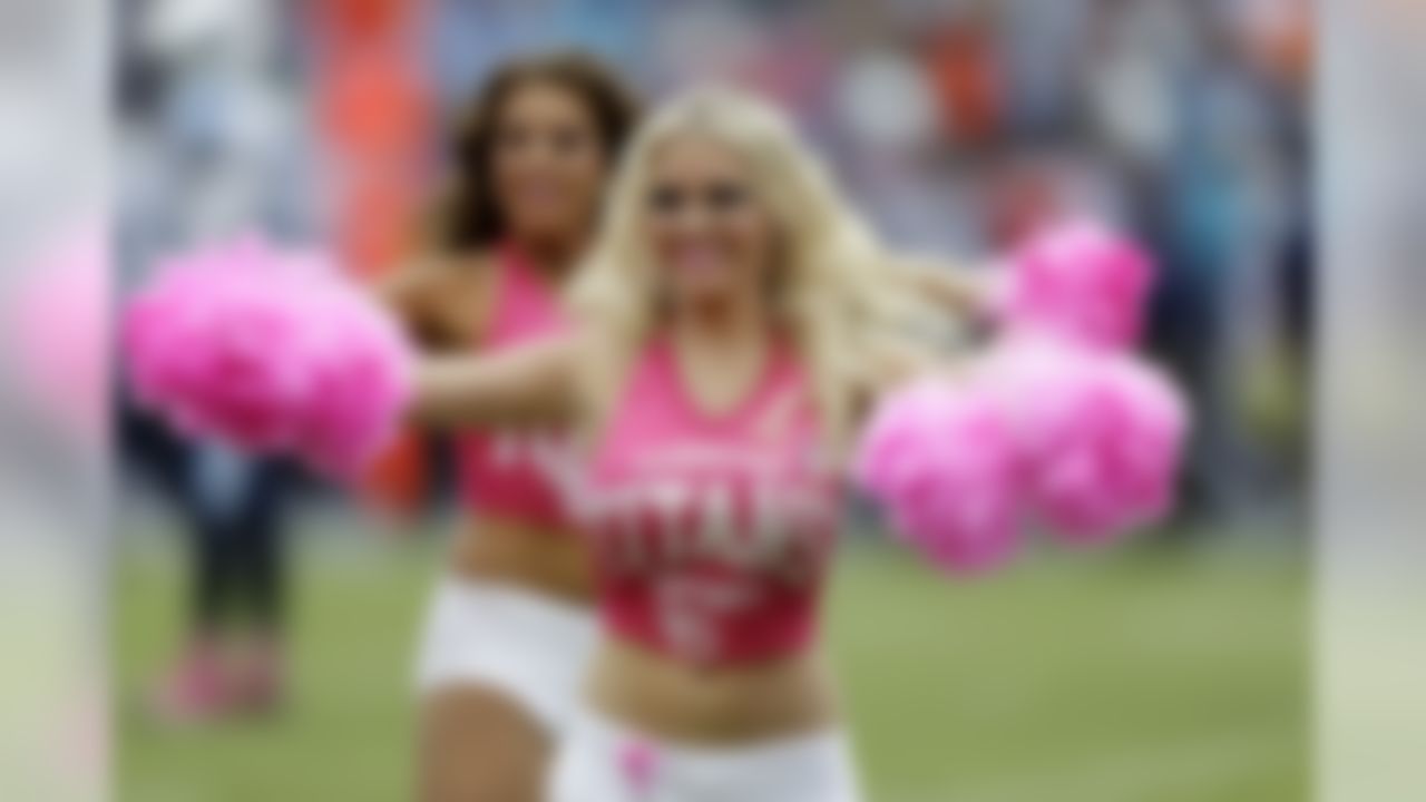 Tennessee Titans cheerleaders perform in the second half of an NFL football game between the Titans and the Cleveland Browns Sunday, Oct. 5, 2014, in Nashville, Tenn. (AP Photo/Wade Payne)