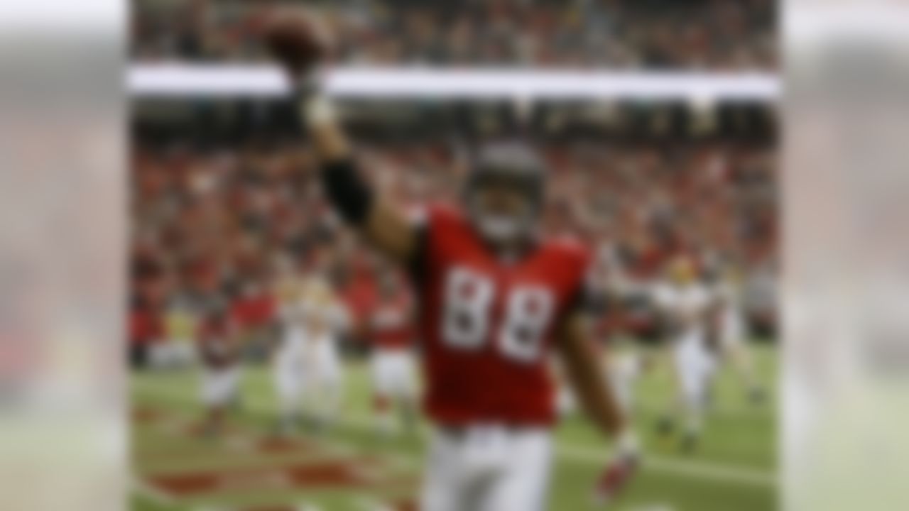 Atlanta Falcons tight end Tony Gonzalez reacts after catching a touchdown pass during the first quarter of an  NFL football game against the Washington Redskins, Sunday, Nov. 8, 2009, in Atlanta. (AP Photo/John Bazemore)