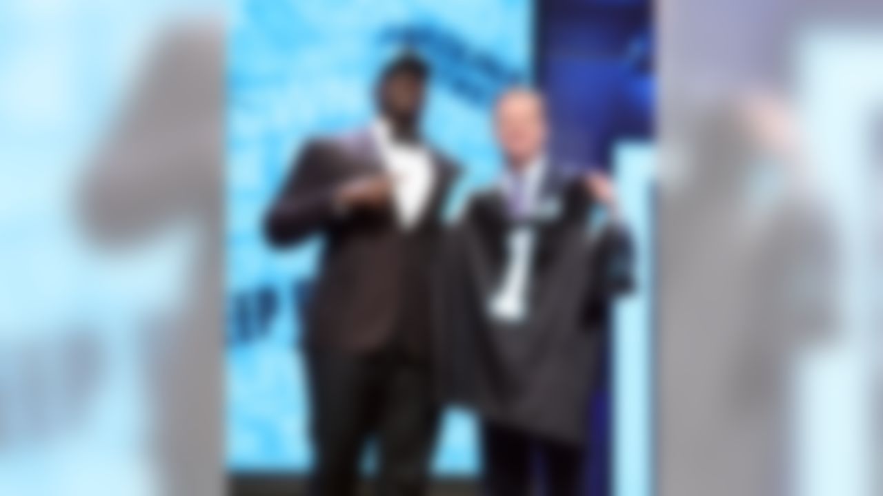 Louisiana Tech defensive tackle Vernon Butler holds up his jersey with NFL Commissioner Roger Goodell after being drafted by the Carolina Panthers during the 2016 NFL Draft at the Auditorium Theatre on Thursday, April 28, 2016 in Chicago. (Perry Knotts/NFL)