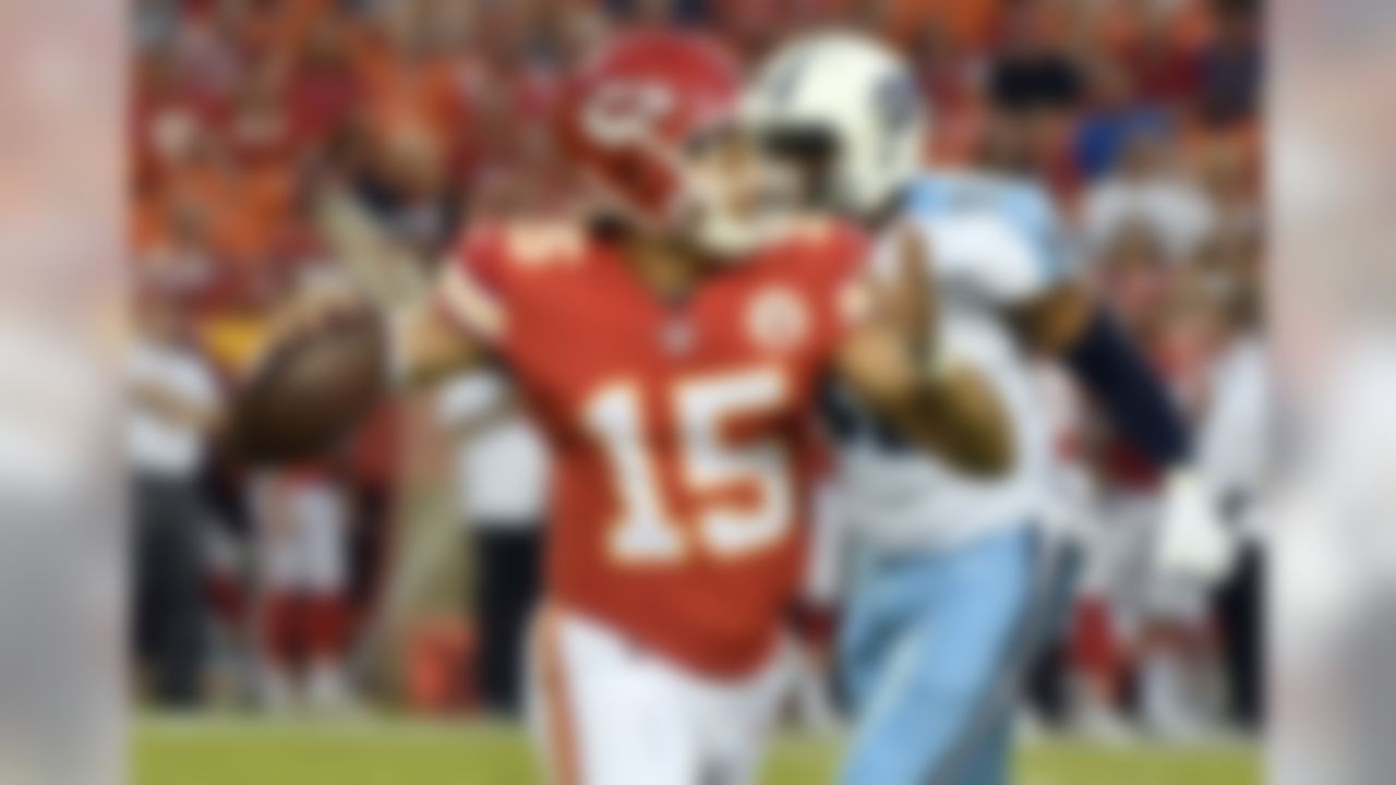 Kansas City Chiefs quarterback Patrick Mahomes (15) prepares to throw in front of Tennessee Titans linebacker Kevin Dodd (93) during the first half of an NFL preseason football game in Kansas City, Mo., Thursday, Aug. 31, 2017. (AP Photo/Ed Zurga)