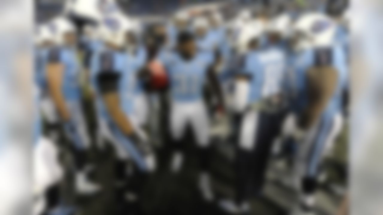 Tennessee Titans safety Bernard Pollard (31) encourages his teammates before an NFL football game against the Indianapolis Colts on Thursday, Nov. 14, 2013, in Nashville, Tenn. (AP Photo/Mark Zaleski)