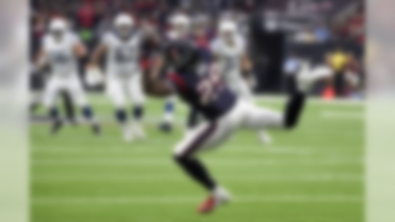 Houston Texans defensive back Andre Hal (29) intercepts a pass thrown by Indianapolis Colts quarterback Andrew Luck during the first half of an NFL football game Sunday, Dec. 9, 2018, in Houston.