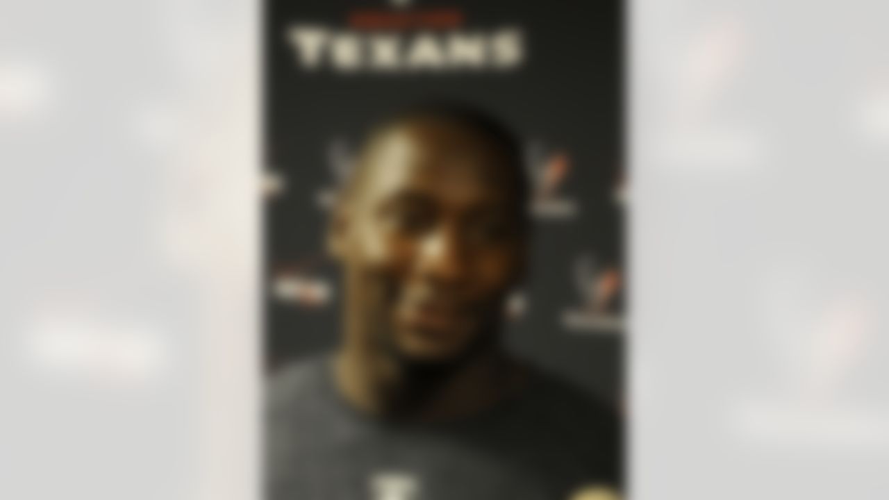 Houston Texans' Antonio Smith faces the media as he reports for NFl football training camp Friday, July 27, 2012, in Houston. The Texans went 10-6 last season and won its first playoff game in 2011 resulting in higher-than-ever expectations. (AP Photo/Pat Sullivan)