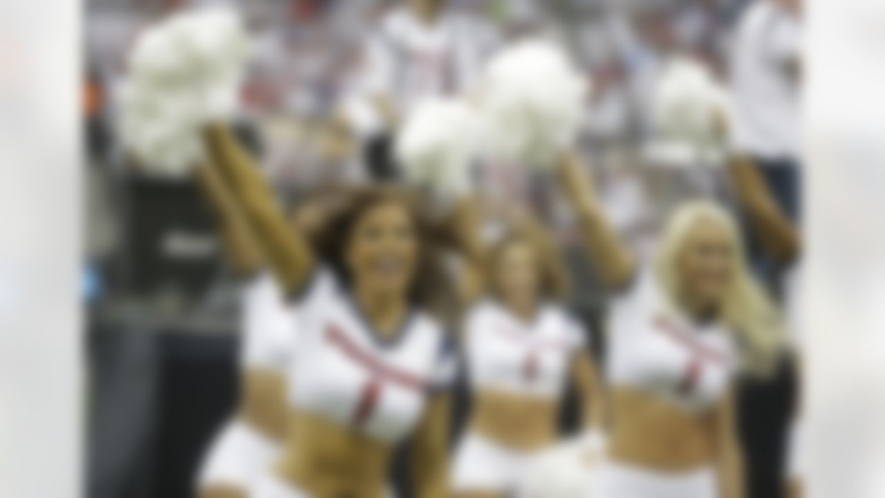 The Houston Texans cheerleaders perform during halftime of an NFL football game Sunday, Sept. 7, 2014, in Houston. (AP Photo/Patric Schneider)