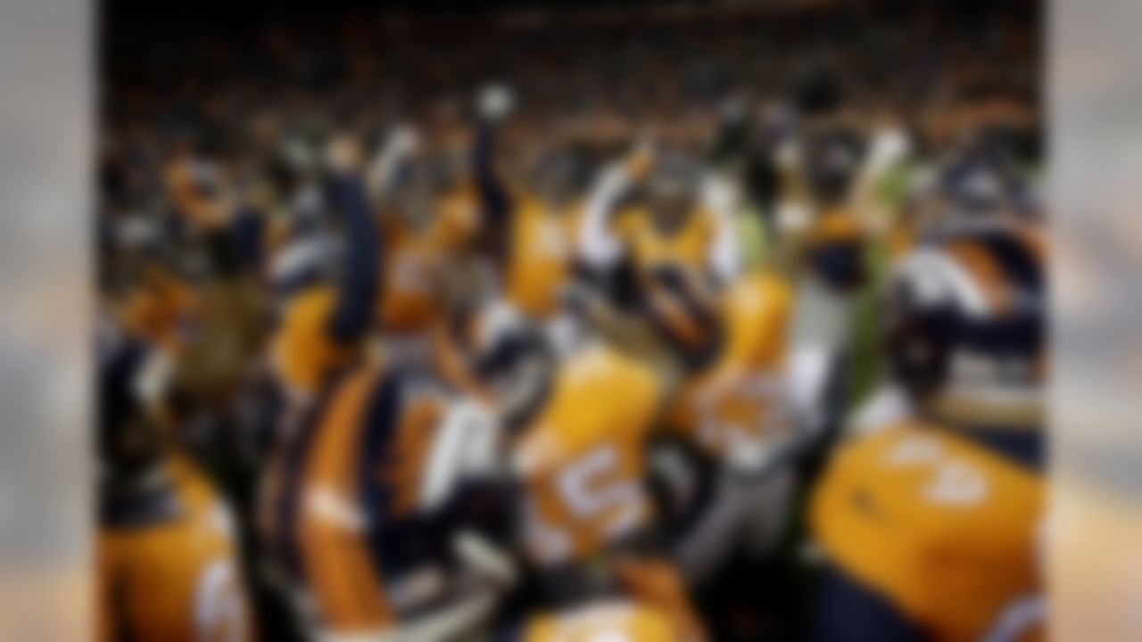 The Denver Broncos huddle up prior to an NFL football game against the Kansas City Chiefs, Sunday, Nov. 27, 2016, in Denver. (AP Photo/Jack Dempsey)